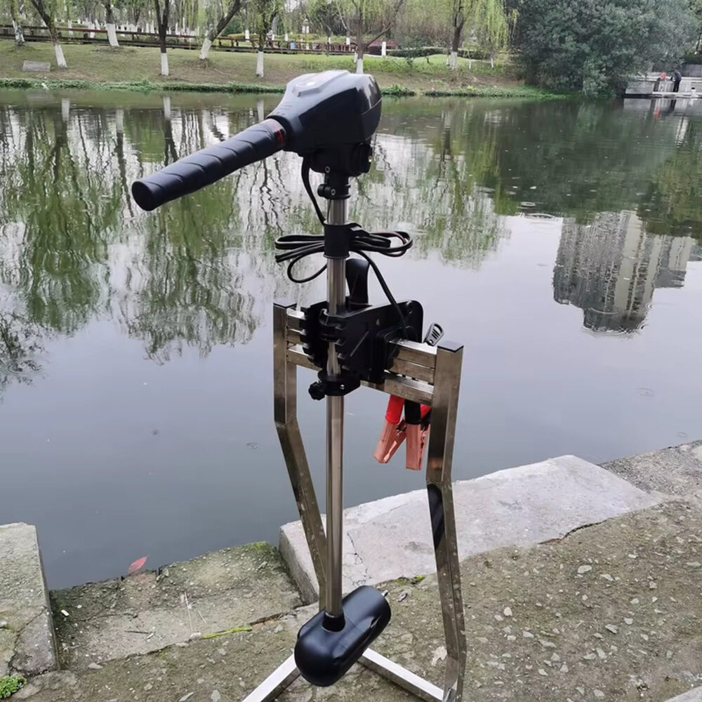 Wattkeel P250 electric outboard motor - transom mount Wattkeel P250 electric outboard motor clamped to a transom bracket beside a lake