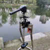 Wattkeel P250 electric outboard motor - transom mount Wattkeel P250 electric outboard motor clamped to a transom bracket beside a lake